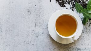 overhead-view-mint-herbal-tea-cup-concrete-backdrop_23-2148186355.jpg