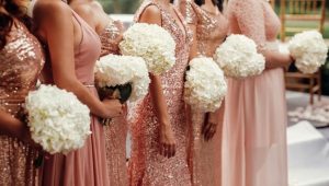 bridesmaids-pink-dresses-stand-with-white-flower-bouquets_8353-8972_compress15.jpg