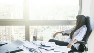 businesswoman-looking-out-window-sitting-office_23-2147857235_compress68.jpg