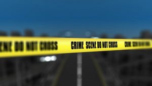 3d-render-crime-scene-tape-against-blurred-city-background_1048-6167