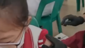 INDIESPOT Polisi Selidiki Video Viral Anak SD Disuntik Vaksin Kosong di Medan
