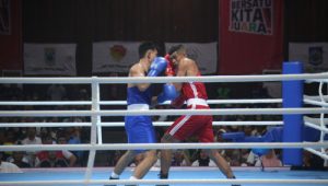 INDIESPOT.ID, Sarohatua Lumban Sagala Menang TKO, Petinju Sumut Robohkan Lawan di PON XXI